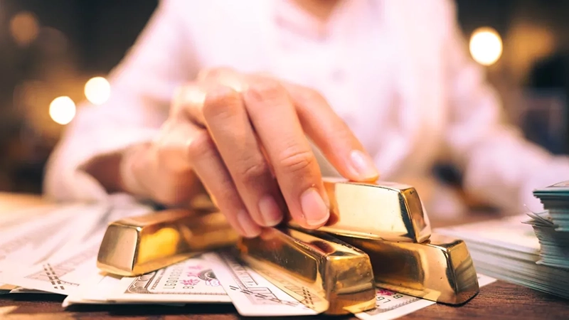شمش های طلا برروی اسکانس دلار